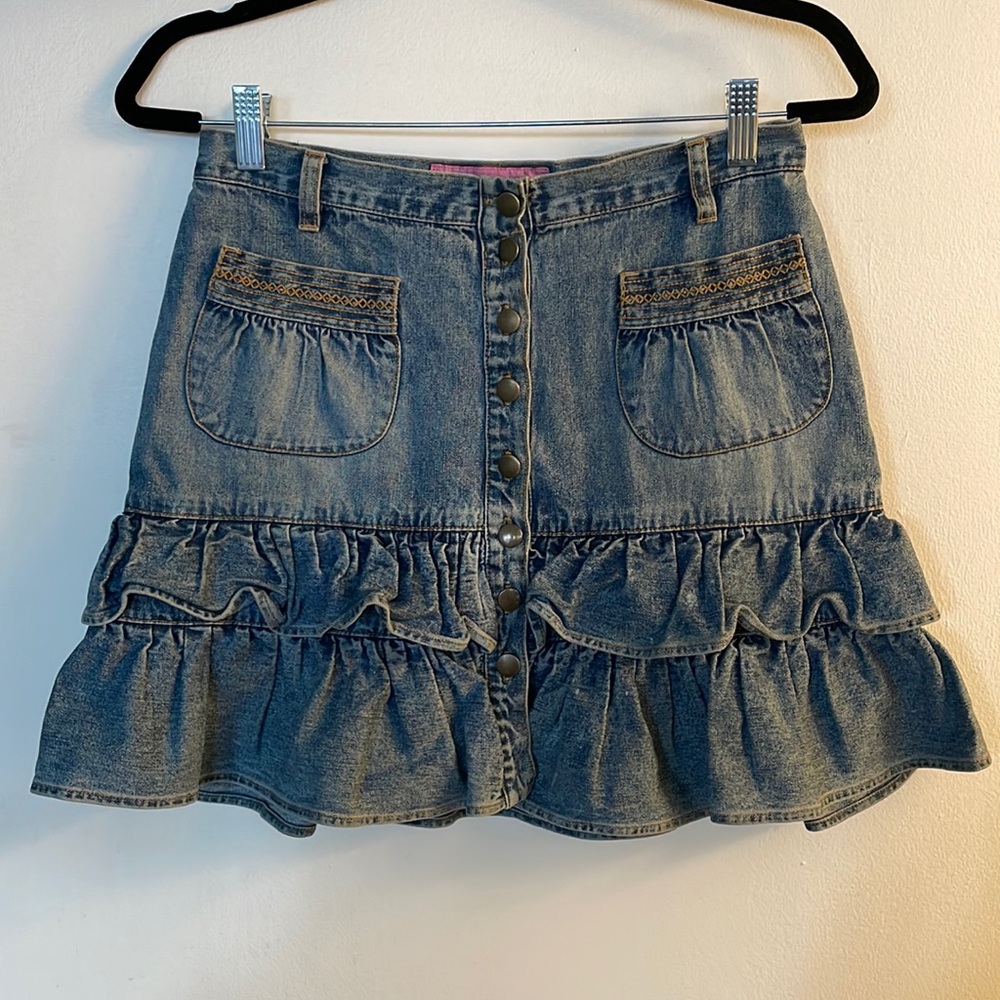 Vintage ruffle hem denim mini skirt with button front.